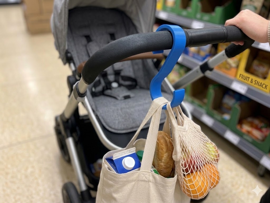 FlexiCarry buggy hook and clip attached to pram – hands-free bag holder