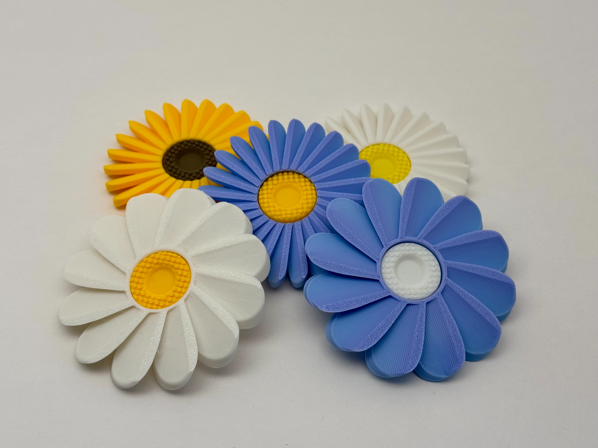 Novelty daisy spinner fidget toy desk accessory UK