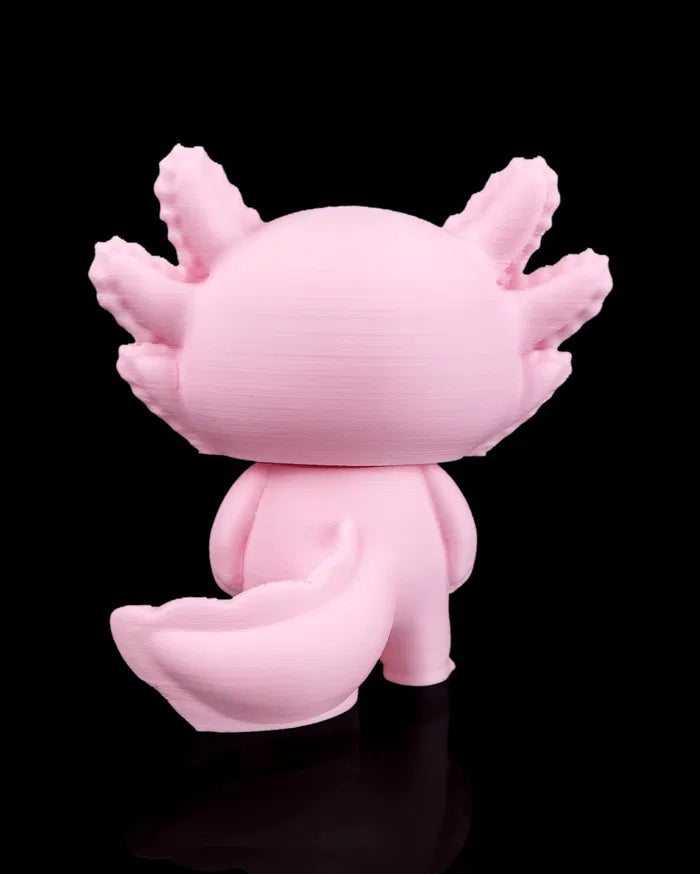 Pink cartoon-like creature on a black background