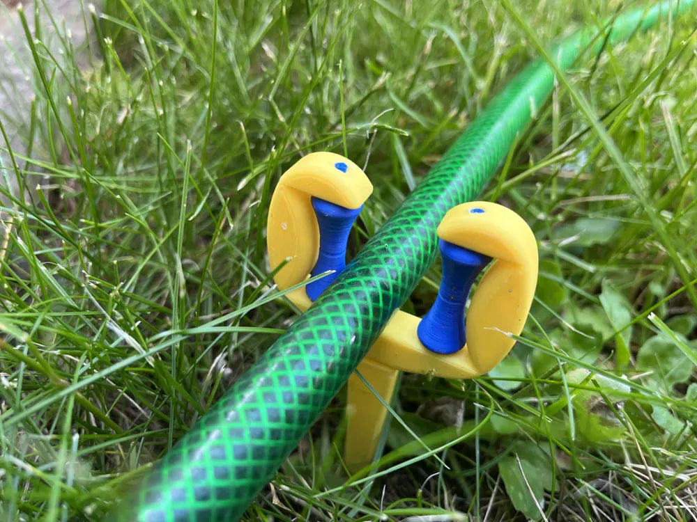 GroundGrip hose stakes in garden – hose anchor pegs by 3DESIGN