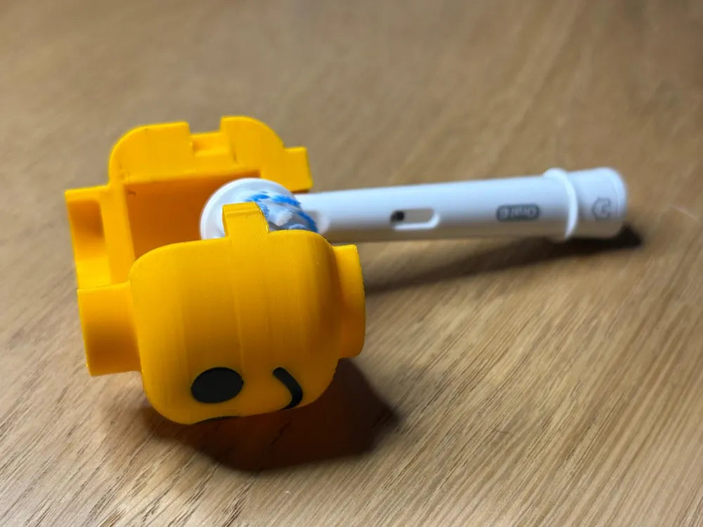 Lego toothbrush cover protecting electric toothbrush head – travel case